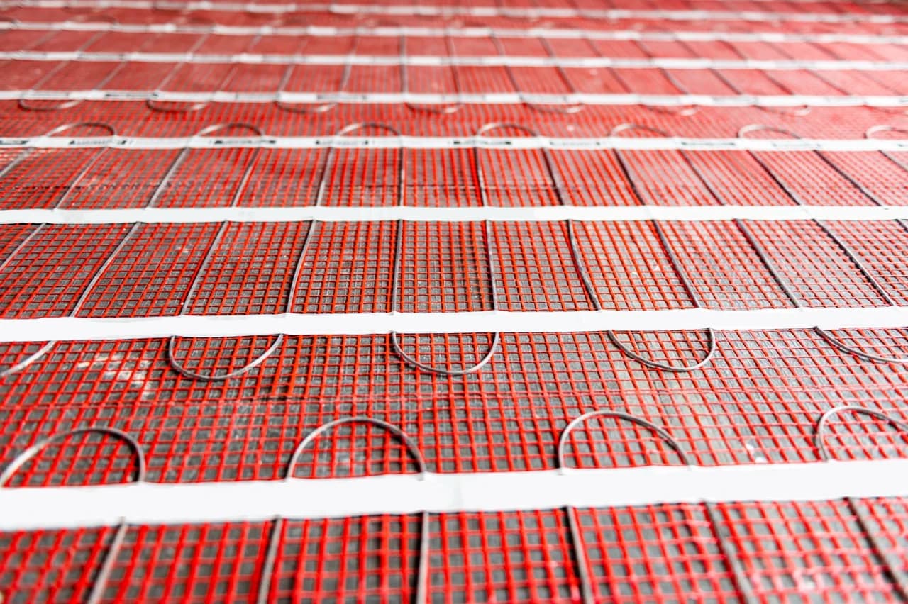Electric underfloor heating mat before floor finish installation