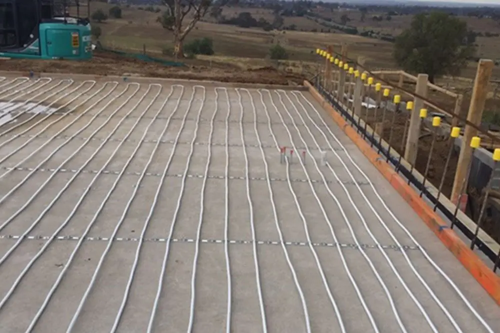 Hydronic underfloor heating pipework installed across a floor area