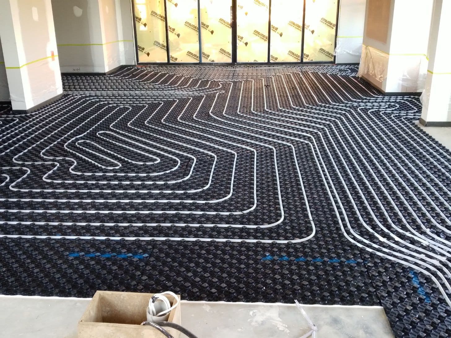 Hydronic heating circuit arranged in a compact spiral layout over Profi Duo boards.