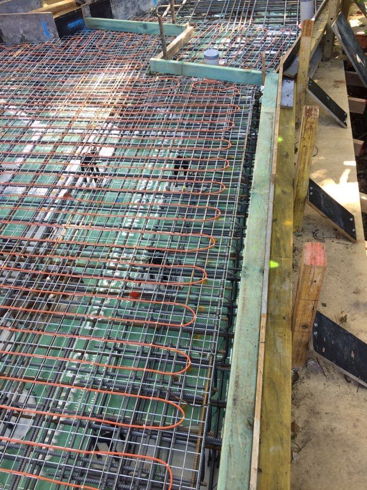 Electric heating cable layout installed across reinforced concrete slab preparation in Bellevue Hill.