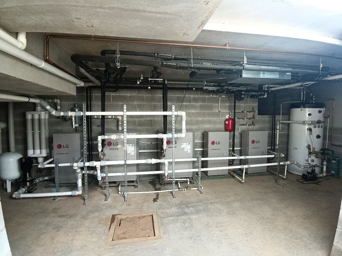 Geothermal plantroom with hydronic units, buffer storage and insulated pipework in Pokolbin.